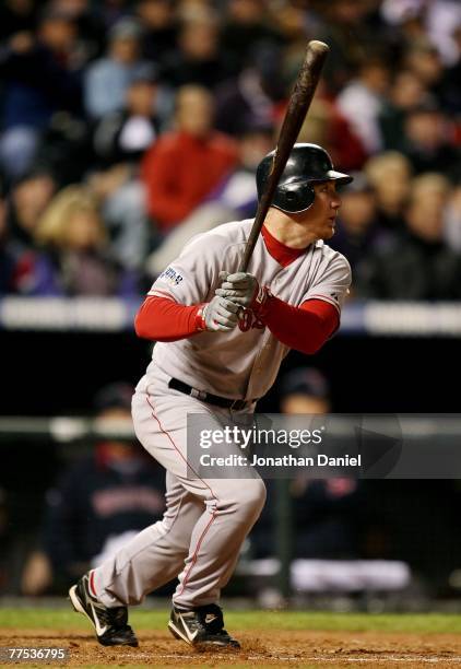 Drew of the Boston Red Sox doubles to lead off the top of the fifth inning against the Colorado Rockies during Game Three of the 2007 Major League...