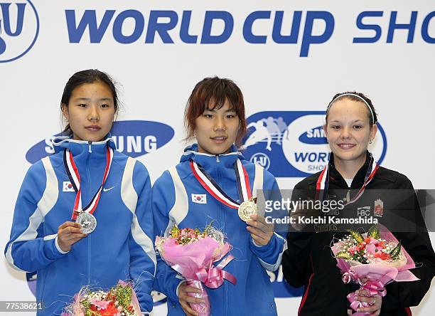 Yang Shin-Young of South Korea and winner of the silver medal, Jin Sun-Yu and winner of the gold medal, Amanda Overland of Canada and winner of the...