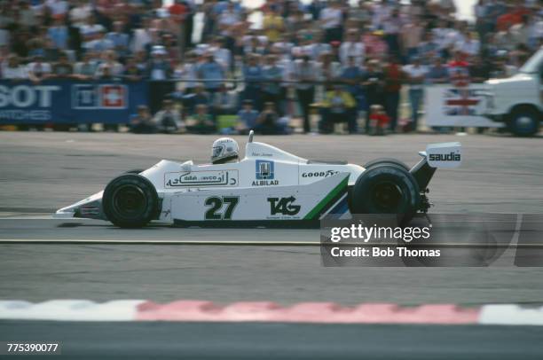 Australian racing driver Alan Jones drives the Albilad-Saudia Racing Team Williams FW07 Ford V8 in the 1979 British Grand Prix at Silverstone circuit...