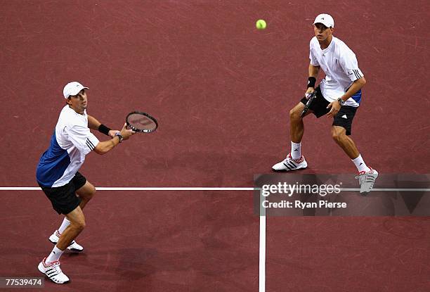 Mike Bryan and Bob Bryan of the USA in action during the Doubles Final against Mark Knowles of the Bahamas and James Blake of the USA during Day Six...