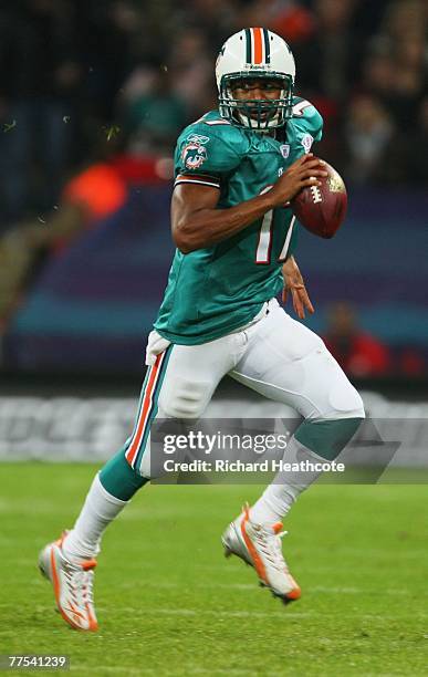 Cleo Lemon of Miami Dolphins scrambles up field during the NFL Bridgestone International Series match between New York Giants and Miami Dolphins at...