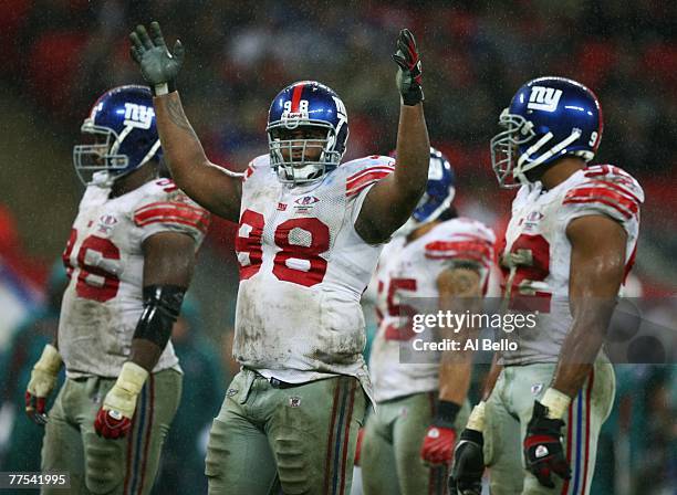 Fred Robbins of New York Giants gestures during the NFL Bridgestone International Series match between New York Giants and Miami Dolphins at Wembley...