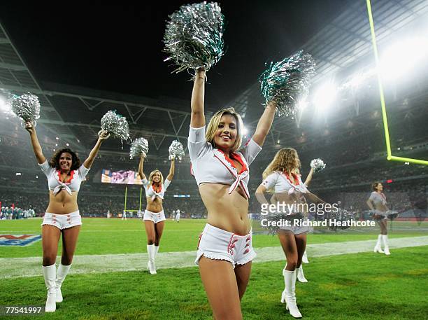 Miami cheerleaders entertain the crowd during the NFL Bridgestone International Series match between New York Giants and Miami Dolphins at Wembley...