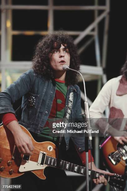 Marc Bolan of English glam rock group T-Rex performs with Gibson Les Paul guitar on the BBC television show 'Top of the Pops', London, 4th August...
