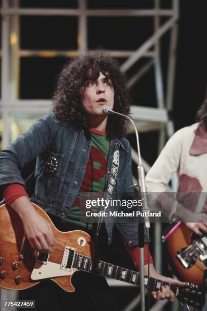 Marc Bolan of English glam rock group T-Rex performs with Gibson Les Paul guitar on the BBC television show 'Top of the Pops', London, 4th August...