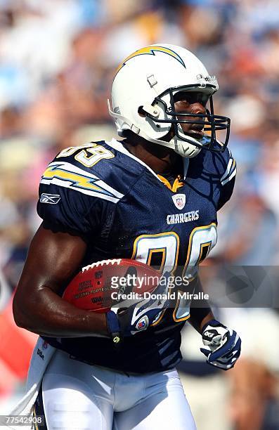 Wide Receiver Chris Chambers of the San Diego Chargers runs out of the endzone after scoring his first touchdown against the Houston Texans during...