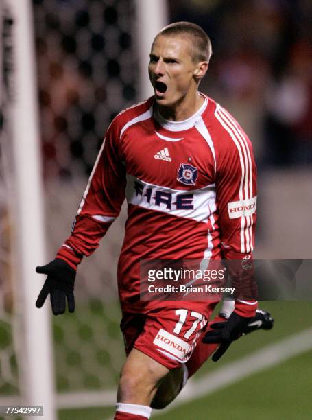 Chicago Fire's Chris Rolfe celebrates his goal against D.C. United during the first half of game 1 of the Eastern Conference Semifinal series at...