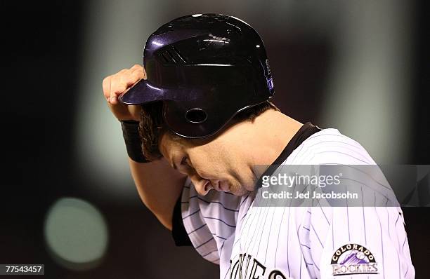 Troy Tulowitzki of the Colorado Rockies reacts after grounding out in the fifth inning against the Boston Red Sox during Game Four of the 2007 Major...