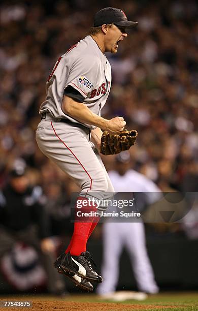 Mike Timlin of the Boston Red Sox celebrates after ending the seventh inning with a strike out against the Colorado Rockies during Game Four of the...