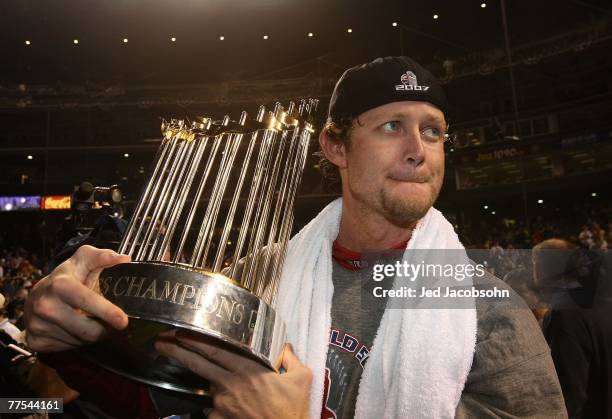 Kyle Snyder of the Boston Red Sox celebrates with the trophy after winning Game Four by a score of 4-3 to win the 2007 Major League Baseball World...