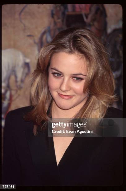 Outstanding Newcomer recipient Alicia Silverstone stands at the National Board of Review Awards February 26, 1996 in New York City. The NBR, which...