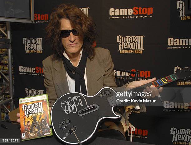 Aerosmith Guitarist, Joe Perry helps celebrate the launch of "Guitar Hero III: Legends of Rock" at Game Stop on October 28, 2007 in New York City.