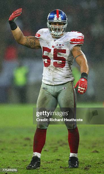 Kawika Mitchell of the Giants gestures during the NFL Bridgestone International Series match between New York Giants and Miami Dolphins at Wembley...
