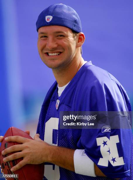 Dallas Cowboys quarterback Tony Romo smiles during NFC practice at NFL Pro Bowl Ohana Day Celebration at Aloha Stadium in Honolulu, HI on Friday,...