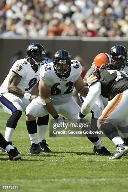 Center Mike Flynn of the Baltimore Ravens blocks against the Cleveland Browns as quarterback Steve McNair drops back to pass at Cleveland Browns...