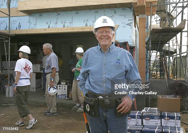 Former U.S. President Jimmy Carter strolls the worksite at the Habitat For Humanity Work Project on October 29, 2007 in San Pedro, California. The...