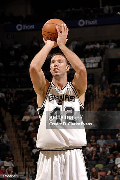 Kris Lang of the San Antonio Spurs shoots during the preseason game against the Golden State Warriors on October 18th at AT&T Center in San Antonio,...