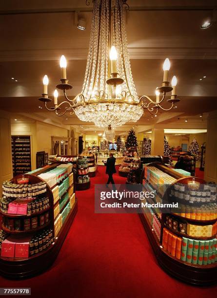 Worker crosses the newly refurbished food hall at Fortnum amd Mason on October 30, 2007 in London. London's most famous food shop will celebrate it's...