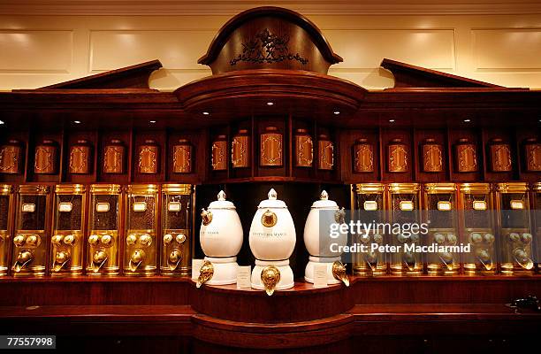 Fresh coffee dispensers line the newly refurbished food hall at Fortnum amd Mason on October 30, 2007 in London. London's most famous food shop will...