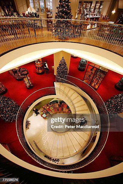 New central staircase leads upwards from the fresh food hall at Fortnum amd Mason on October 30, 2007 in London. London's most famous food shop will...