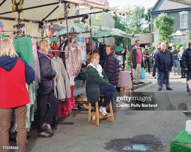 Patsy Palmer, playing Bianca Butcher, with extra Jane Slaughter on the set of BBC soap opera Eastenders, circa 1999.