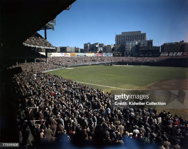 Band plays the national anthem as the flag is raised in centerfield prior to game 6 of the World Series on October 5, 1947 between the Brooklyn...