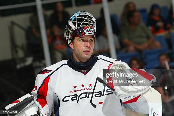 Goaltender Olie Kolzig of the Washington Capitals pauses during the action against the New York Islanders on October 8, 2007 at the Nassau Coliseum...