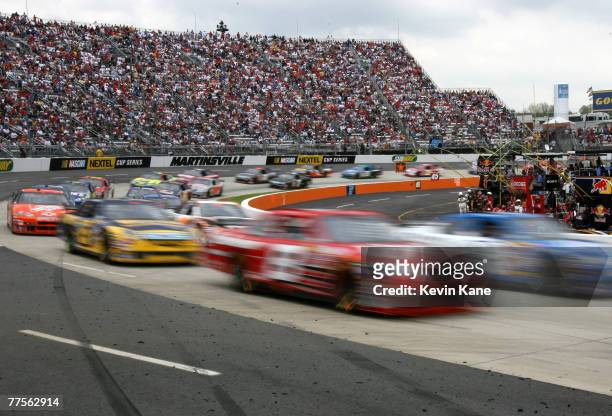 Race action during the NASCAR Nextel Cup Series Goody's Cool Orange 500 at the Martinsville Speedway