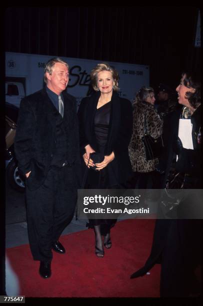 Director Mike Nichols stands with his wife, reporter Diane Sawyer, at the premiere of the film "The Birdcage" March 3, 1996 in New York City. Nichols...