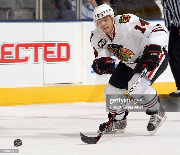 Sergei Samsonov of the Chicago Blackhawks carries the puck up ice during game action against the Toronto Maple Leafs October 20, 2007 at the Air...