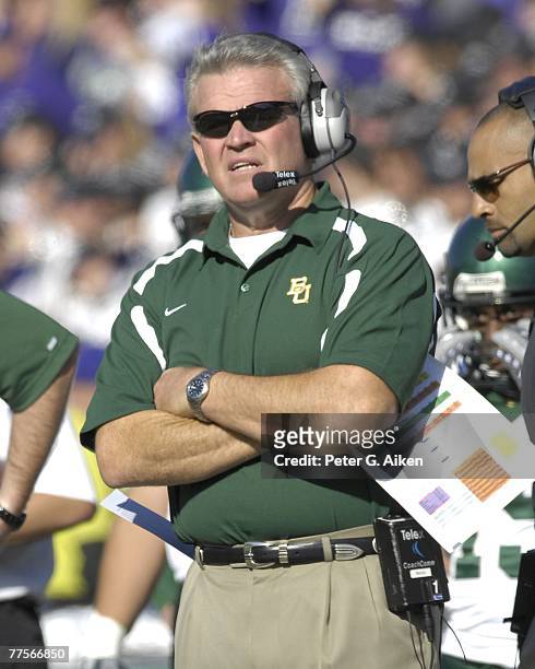 Head coach Guy Morriss of the Baylor Bears looks out onto the field in the first half against the Kansas State Wildcats, during a NCAA football game...