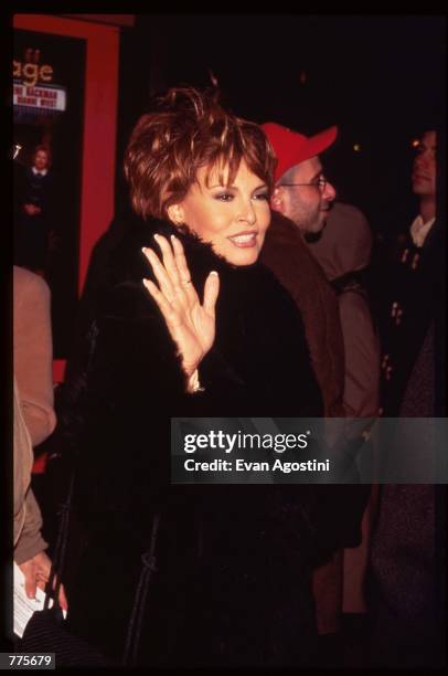 Actress Raquel Welch waves at the premiere of the film "The Birdcage" March 3, 1996 in New York City. The movie, which stars Robin Williams and...