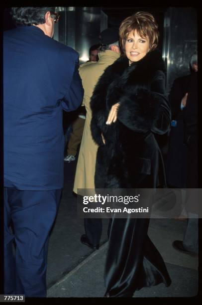 Actress Raquel Welch stands at the premiere of the film "The Birdcage" March 3, 1996 in New York City. The movie, which stars Robin Williams and...