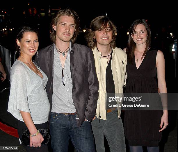 Singer Taylor Hanson and wife Natalie and singer Zac Hanson and wife Kate arrive at the "Darfur Now" Los Angeles screening at the Directors Guild of...