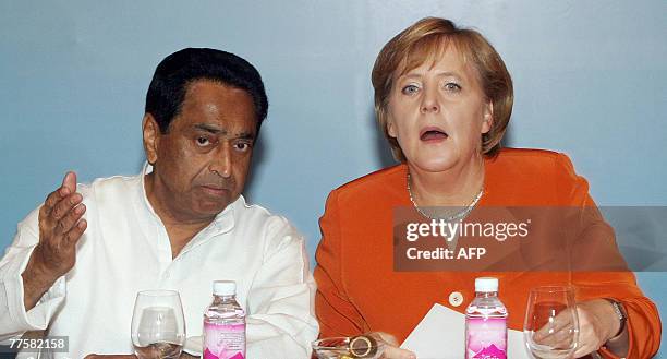 Indian Minister for Commerce Kamal Nath talks with German Chancellor Angela Merkel during a meeting in a hotel in Mumbai, 31 October 2007. Merkel met...