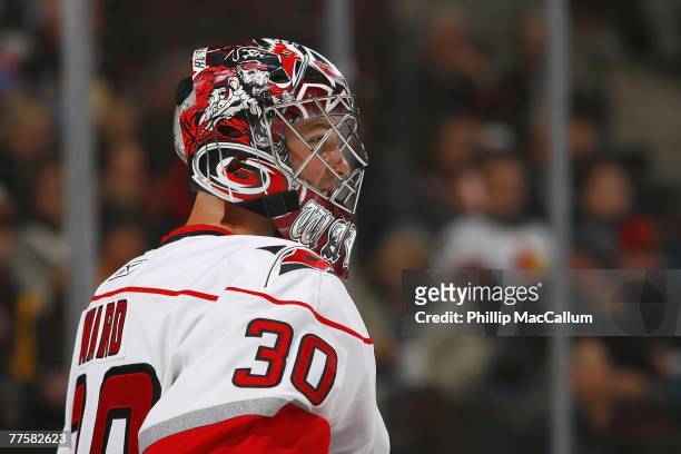 Cam Ward of the Carolina Hurricanes looks on during the NHL game against the Ottawa Senators at the Scotiabank Place on October 11, 2007 in Ottawa,...
