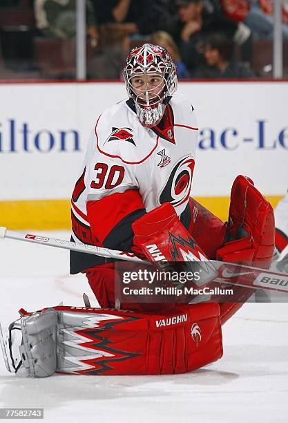 Cam Ward of the Carolina Hurricanes protects the goal during the NHL game against the Ottawa Senators at the Scotiabank Place on October 11, 2007 in...