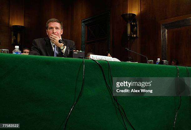 Assistant Attorney General Kenneth Wainstein of the National Security Division at U.S. Justice Department testifies during a hearing before the...