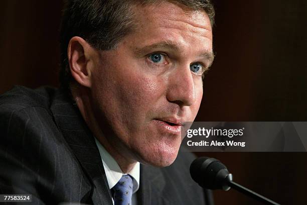 Assistant Attorney General Kenneth Wainstein of the National Security Division at U.S. Justice Department testifies during a hearing before the...