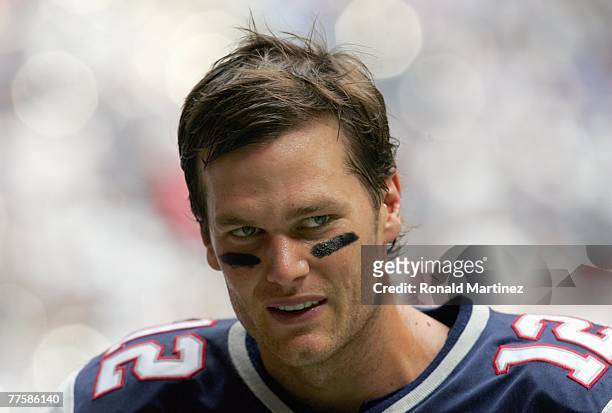 Quarterback Tom Brady of the New England Patriots walks off the field during the game against the Dallas Cowboys at Texas Stadium on October 14, 2007...