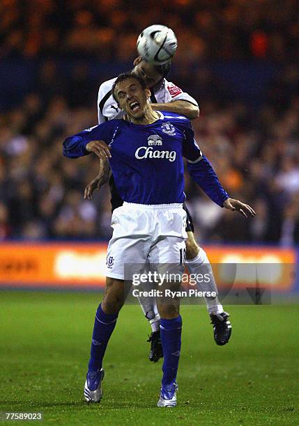 Alan Goodall of Luton Town competes for the ball against Phil Neville of Everton during the Carling Cup Fourth Round match between Luton Town and...