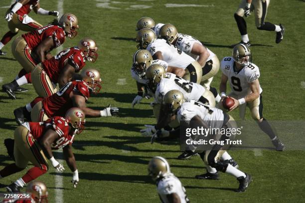 October 28: Quarterback Drew Brees of the New Orleans Saints drops back with the ball during the game against the San Francisco 49ers on October 28,...