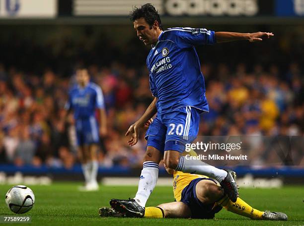 Paulo Ferreira of Chelsea is tackled by Matty Fryatt of Leicester City during the Carling Cup Fourth Round match between Chelsea and Leicester City...