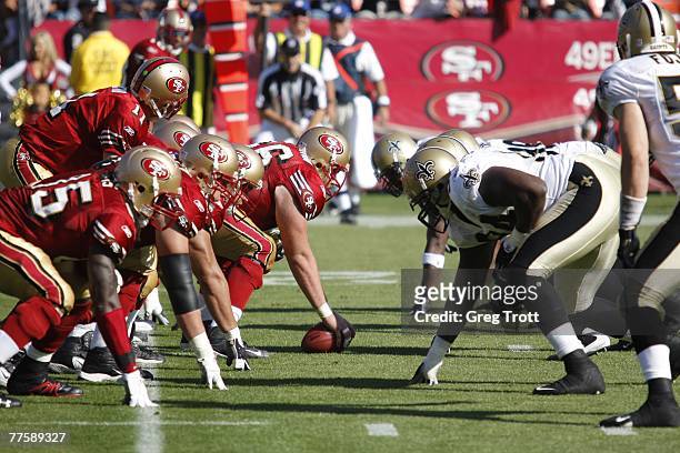 October 28: Center Justin Heitmann and quarterback Alex Smith of the San Francisco 49ers get ready to hike the ball during the game against the New...