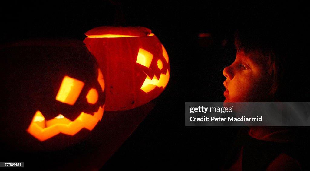 Children Enjoy Traditional Halloween Pumpkins