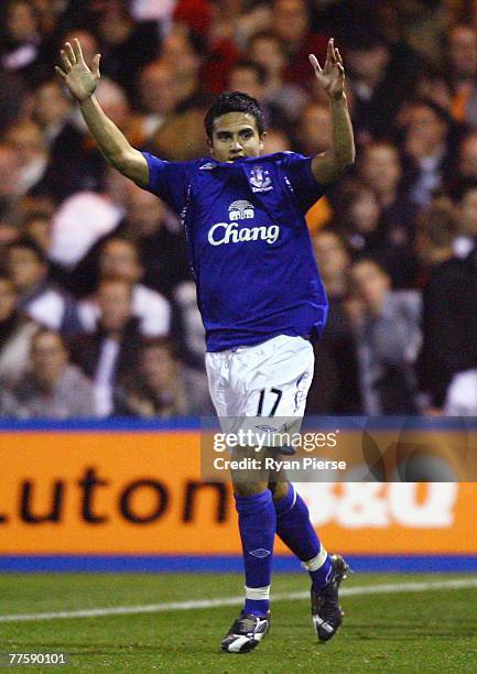 Tim Cahill of Everton celebrates after scoring his team's first goal during the Carling Cup Fourth Round match between Luton Town and Everton at...