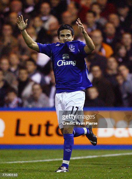 Tim Cahill of Everton celebrates after scoring his team's first goal during the Carling Cup Fourth Round match between Luton Town and Everton at...