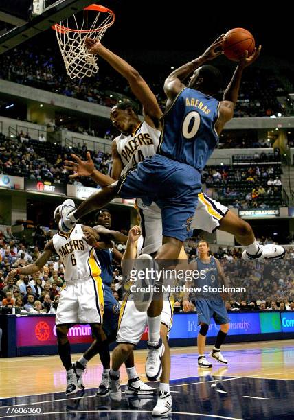 Courtney Sims of the Indiana Pacers collides with Gilbert Arenas of the Washington Wizards October 31, 2007 at Conseco Fieldhouse in Indianapolis,...