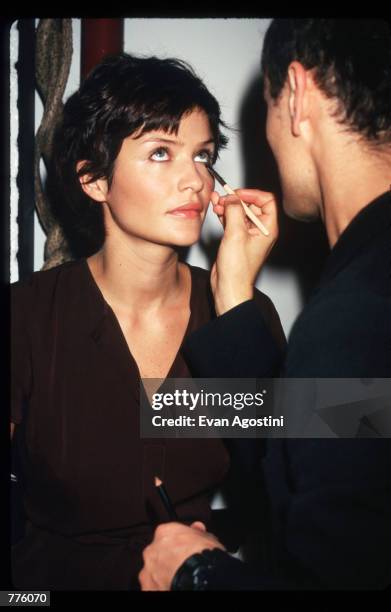 Helena Christensen prepares to model clothing from the Marc Jacobs Spring 97 collection October 28, 1996 in New York City. Designer Marc Jacobs, who...