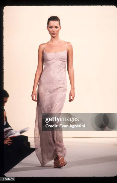 Kate Moss models clothing from the Marc Jacobs Spring 97 collection October 28, 1996 in New York City. Designer Marc Jacobs, who prompted the grunge...